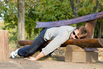 depositphotos_13734990-stock-photo-exhausted-man-sleeping-on-bench.jpg